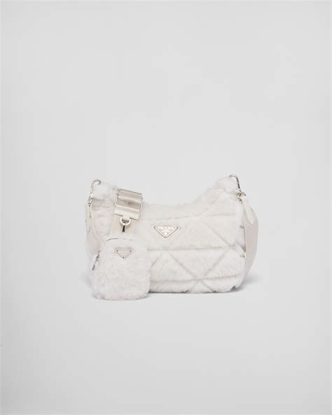 fluffy white prada bag|More.